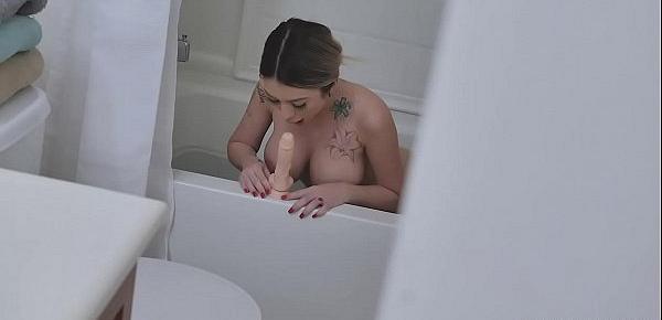  Kat Diors naughty stepson is wondering why she is taking so long in the bathroom and caught her riding on her favorite sex toy while taking a shower.